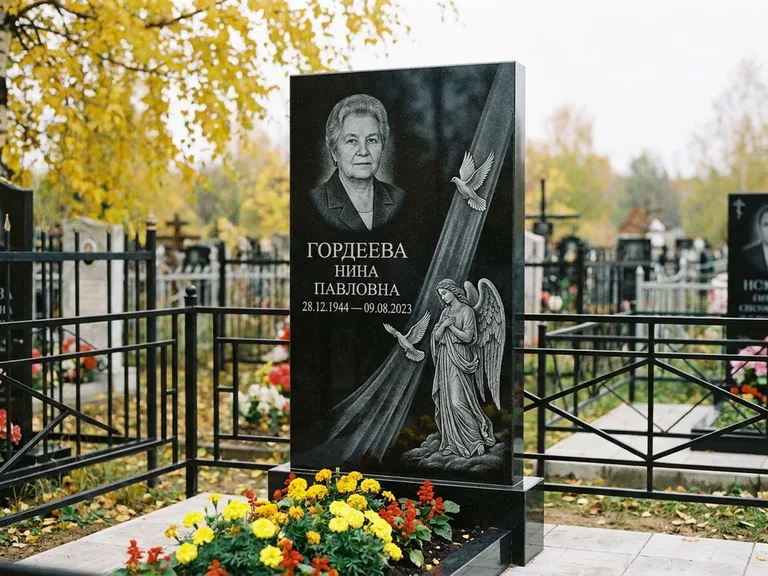 Памятник с гравировкой ангела — гравировка ангела с голубем по диагонали стелы, работа «Гордеева» в Тольятти